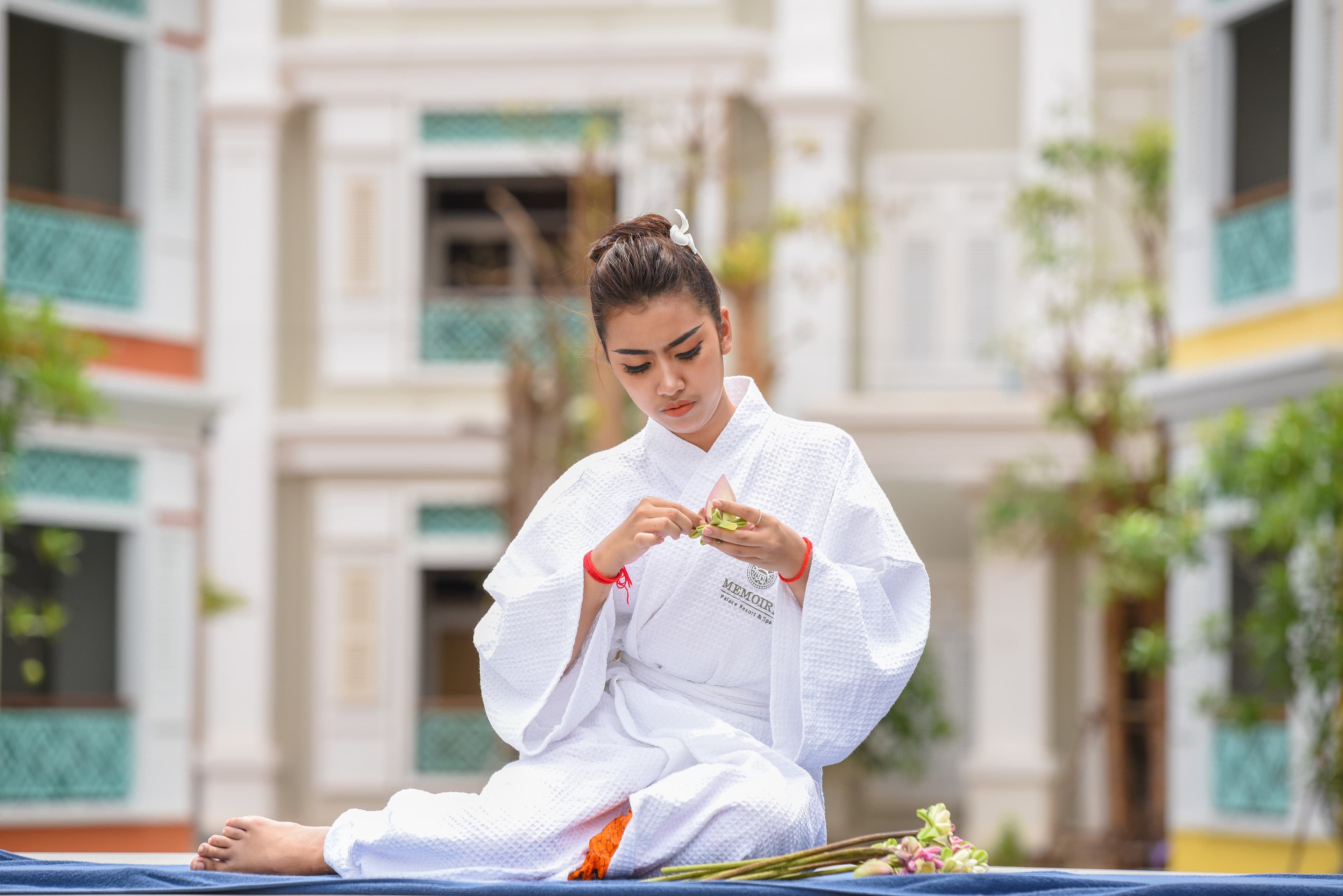 Woman in spa robe relaxing